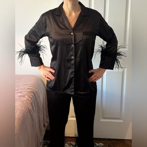 Black satin pajama set with faux feather trim